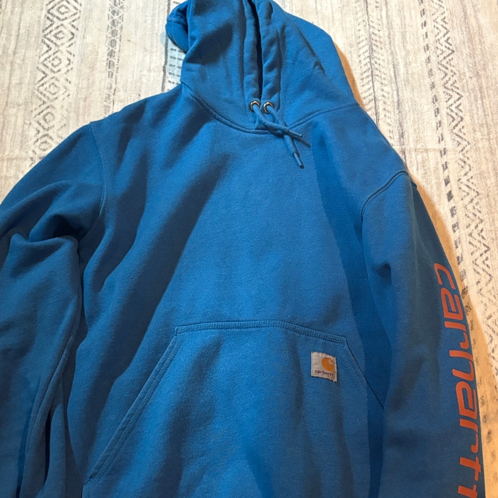 Carhartt Teal Hoodie with Orange Logo
